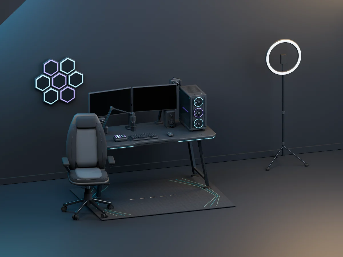 Graphite gaming desk with dual monitors, contoured chair, PC, boom microphone, camera arm, macro pad and ring light