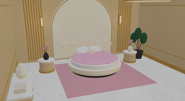 A circular bed with ivory hearts and pink bedding in the furnished showroom.