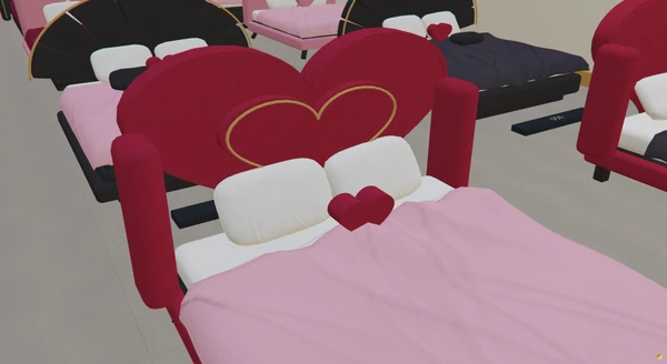 A red heart headboard with gold trim and a matching heart cushion.