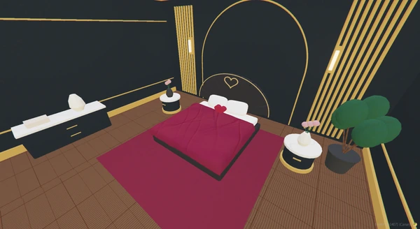 A black fan headboard with burgundy bedding in the furnished showroom.